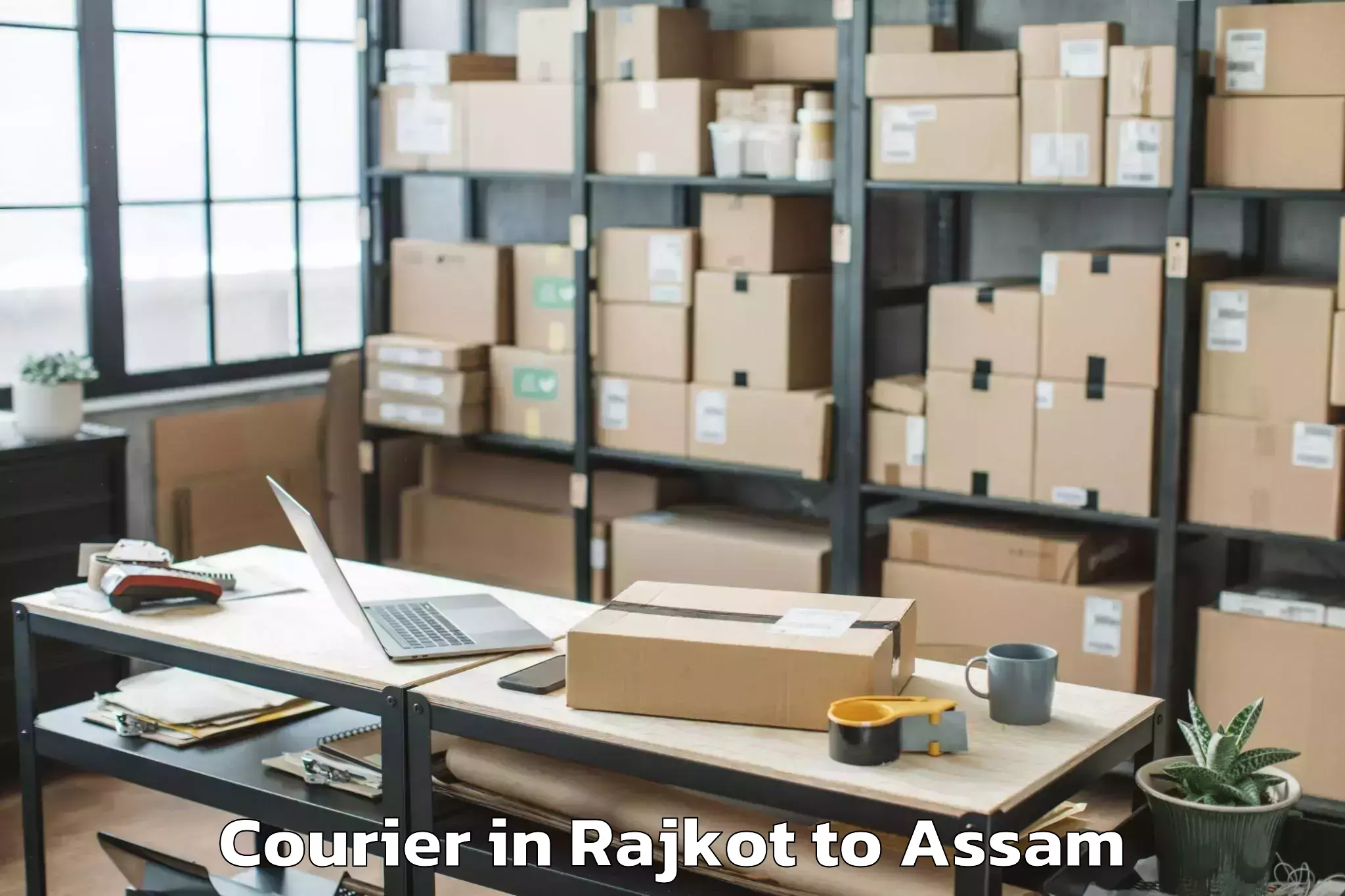 Hassle-Free Rajkot to Kharupetia Courier